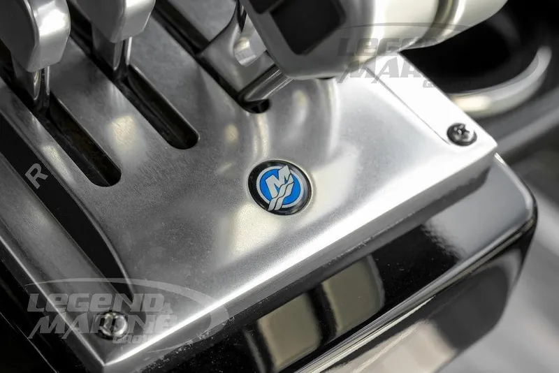 Slide: The Image of Control panel of 2023 Nor-Tech 390 Sport Center Console with Garmin display and anchor switches. - 21