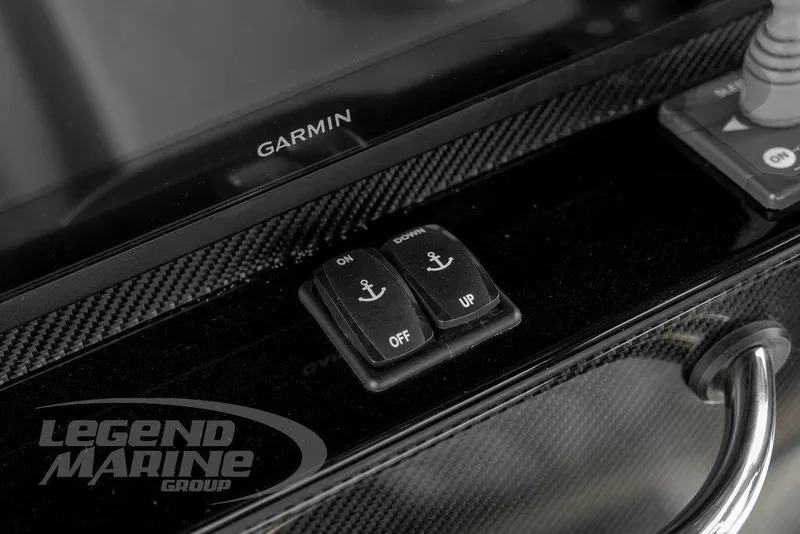 Slide: The Image of Control panel of 2023 Nor-Tech 390 Sport Center Console with Garmin display and Mercury keypad. - 22