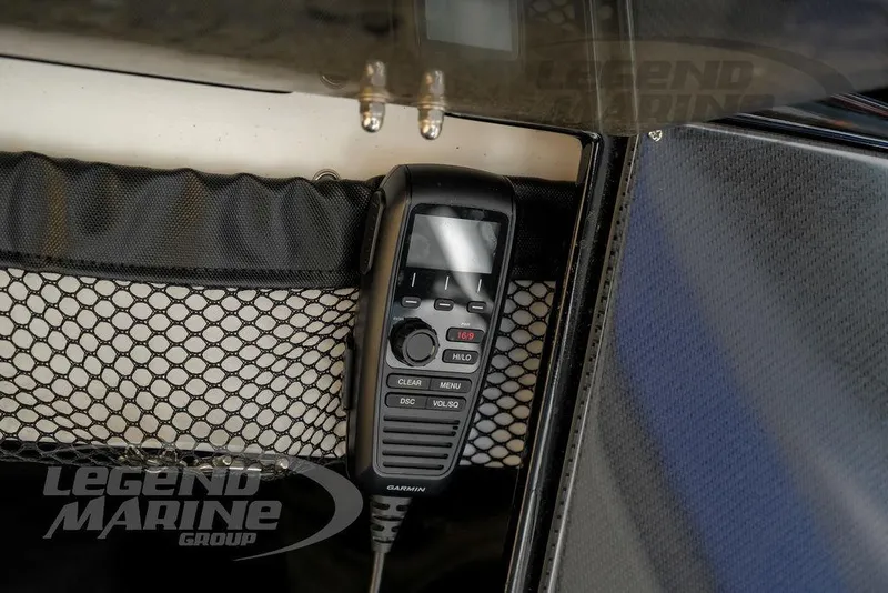 Slide: The Image of Handheld radio in Nor-Tech 390 Sport Center Console, 2023 model, with mesh storage pocket. - 29