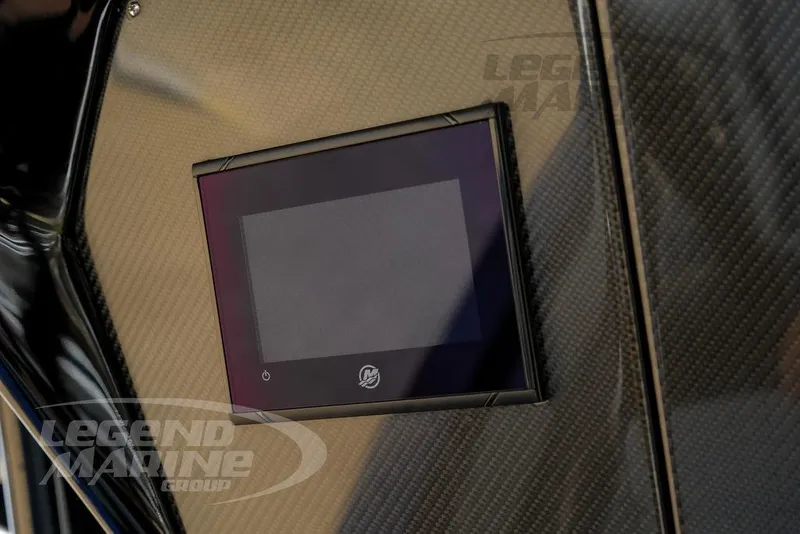 Slide: The Image of Close-up of 2023 Nor-Tech 390 Sport Center Console speaker and metallic frame. - 31