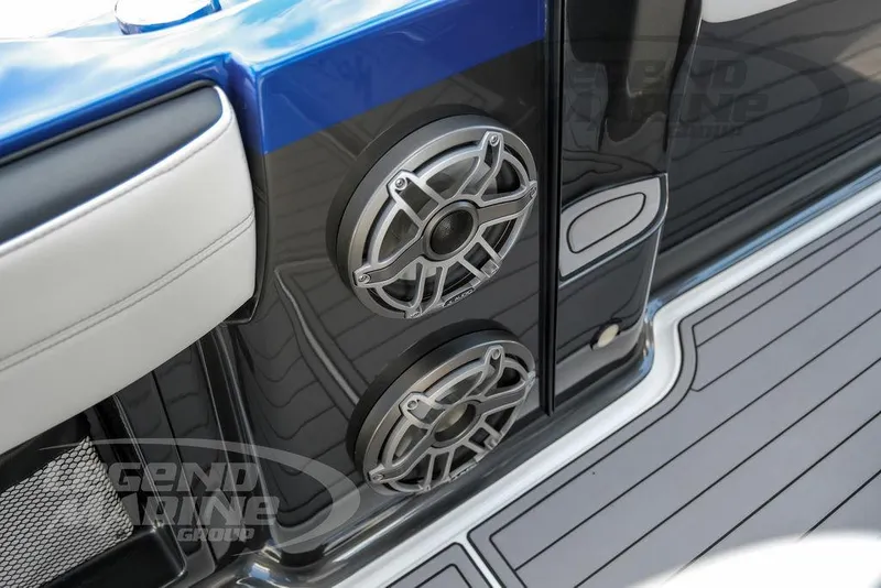 Slide: The Image of Close-up of 2023 Nor-Tech 390 Sport Center Console logo on sleek gray surface. - 34