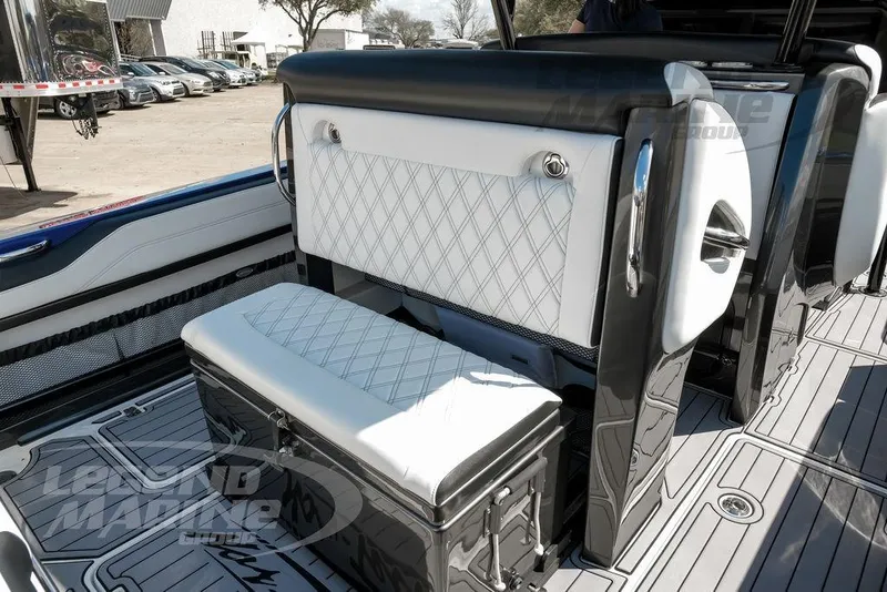 Slide: The Image of 2023 Nor-Tech 390 Sport Center Console speakers and deck detail. - 36