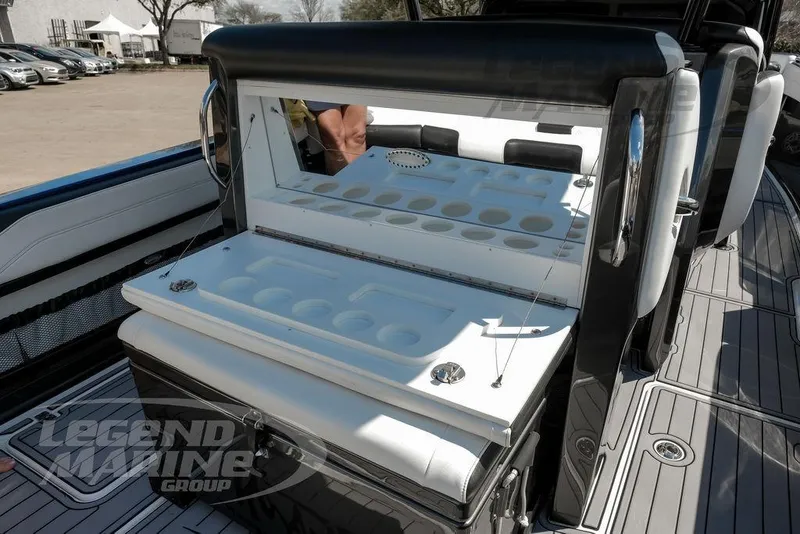 Slide: The Image of Nor-Tech 390 Sport Center Console 2023 logo on sleek boat deck. - 43