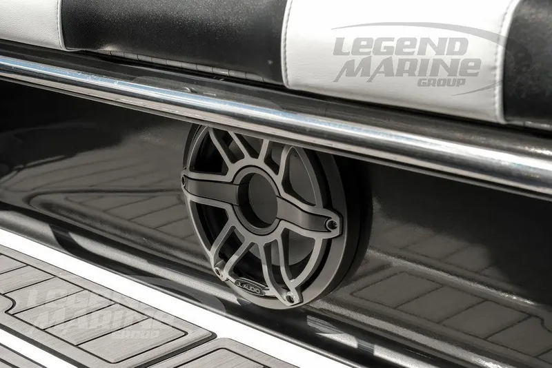 Slide: The Image of 2023 Nor-Tech 390 Sport Center Console interior with white seating and cup holder. - 51