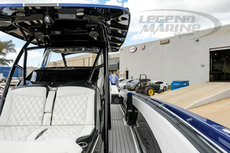 Slide: The Image of 2023 Nor-Tech 390 Sport Center Console boat at Legend Marine Group dealership. - 57