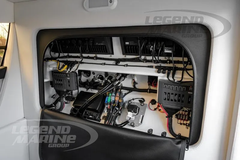 Slide: The Image of JL Audio system displaying low voltage alert on Nor-Tech 390 Sport Center Console, 2023 model. - 79