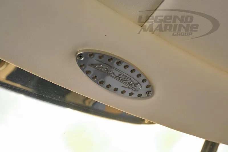 Slide: The Image of 2023 Nor-Tech 390 Sport Center Console boat with blue and black design at Legend Marine Group. - 88
