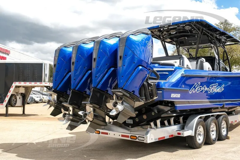 Slide: The Image of Blue Racing 450 outboard engines on 2023 Nor-Tech 390 Sport Center Console boat. - 93