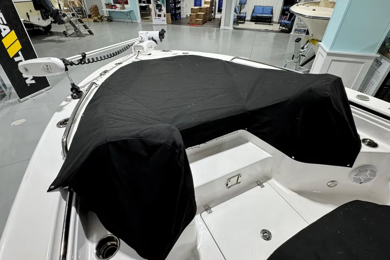Slide: The Image of 2025 Crevalle 24 HCO boat interior with black cover, showcasing modern design and equipment. - 53