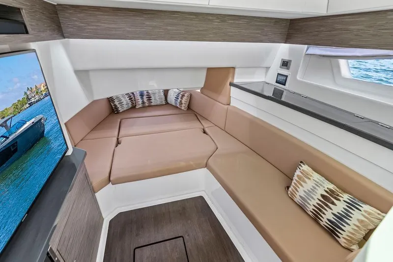 Slide: The Image of Luxurious interior of 2022 Aviara AV40 OB boat with plush seating and modern design. - 19
