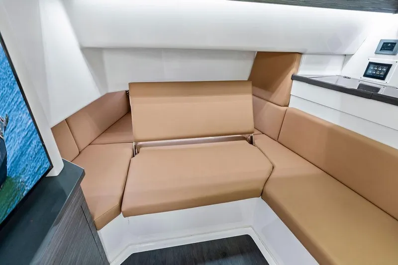 Slide: The Image of 2022 Aviara AV40 OB interior with tan seating and modern design. - 24