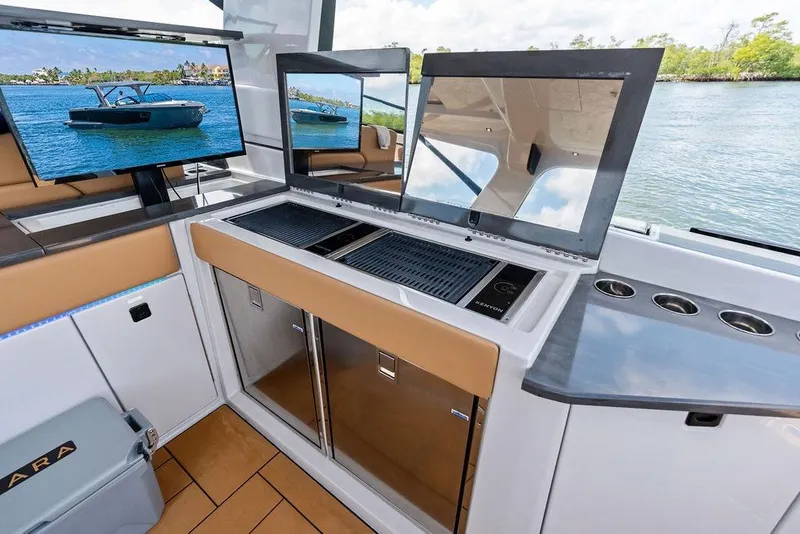 Slide: The Image of 2022 Aviara AV40 OB yacht interior with modern kitchen and scenic water view. - 27