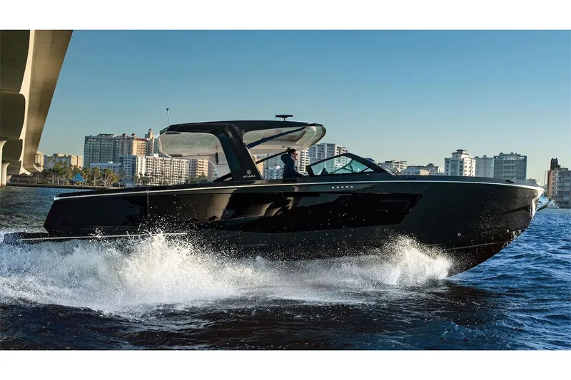 Slide: The Image of Manufacturer Provided Image: 2022 Aviara AV40 OB luxury boat cruising on water near cityscape. - 47