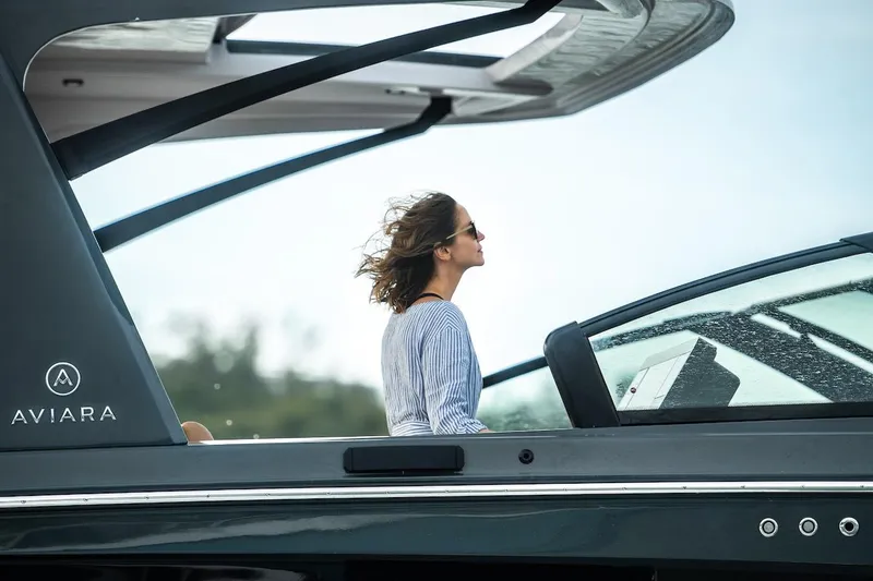 Slide: The Image of Manufacturer Provided Image: 2022 Aviara AV40 OB luxury boat with a woman enjoying the view. - 48