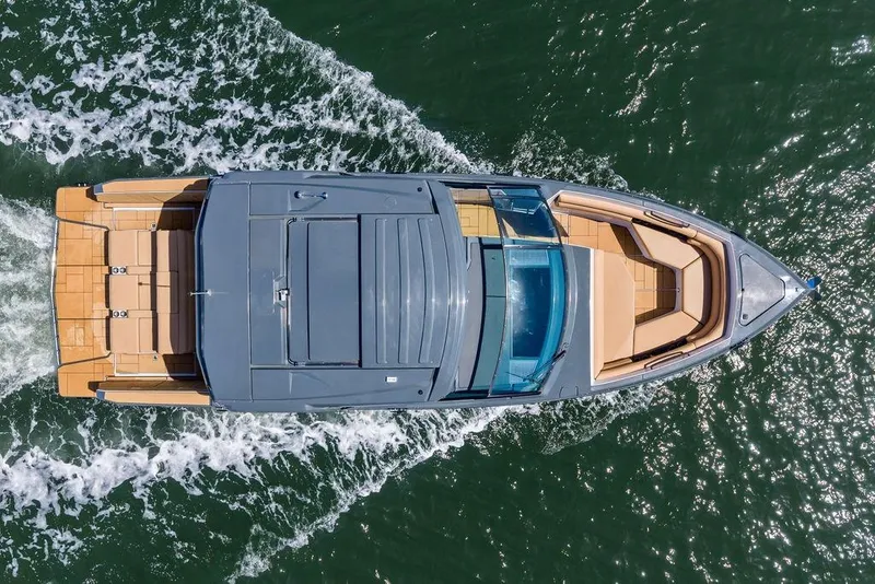 Slide: The Image of Overhead view of 2022 Aviara AV40 OB boat cruising on water. - 6