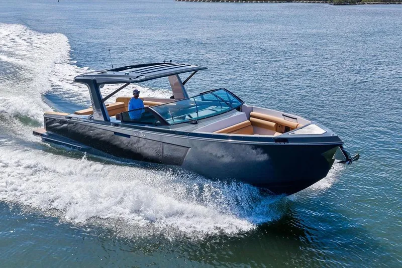 Slide: The Image of 2022 Aviara AV40 OB luxury boat cruising on open water. - 13