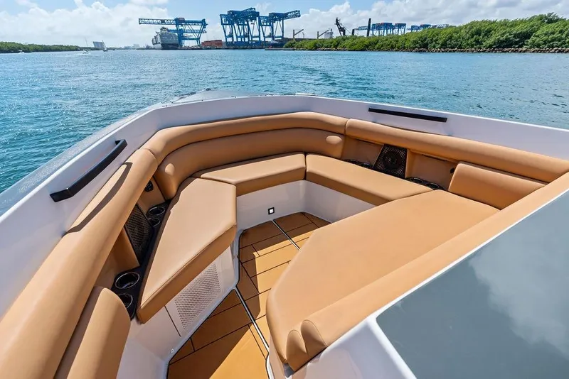 Slide: The Image of Luxurious seating on 2022 Aviara AV40 OB boat with scenic waterfront view. - 14