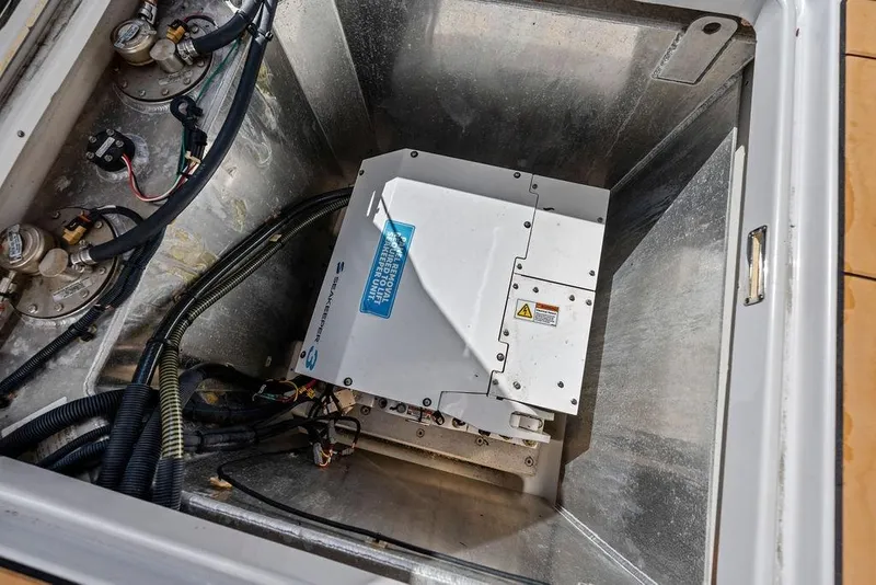 Slide: The Image of 2022 Aviara AV40 OB engine compartment with Seakeeper stabilizer unit and wiring. - 44