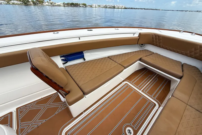 Slide: The Image of Luxurious seating on 2022 Invincible 39 Open Fisherman boat with scenic water view. - 26