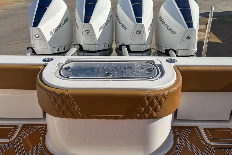 Slide: The Image of 2022 Invincible 39 Open Fisherman with four Mercury outboard engines and stylish seating. - 3