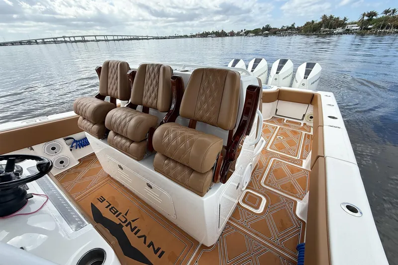 Slide: The Image of 2022 Invincible 39 Open Fisherman boat interior with luxurious seating and stylish flooring. - 30