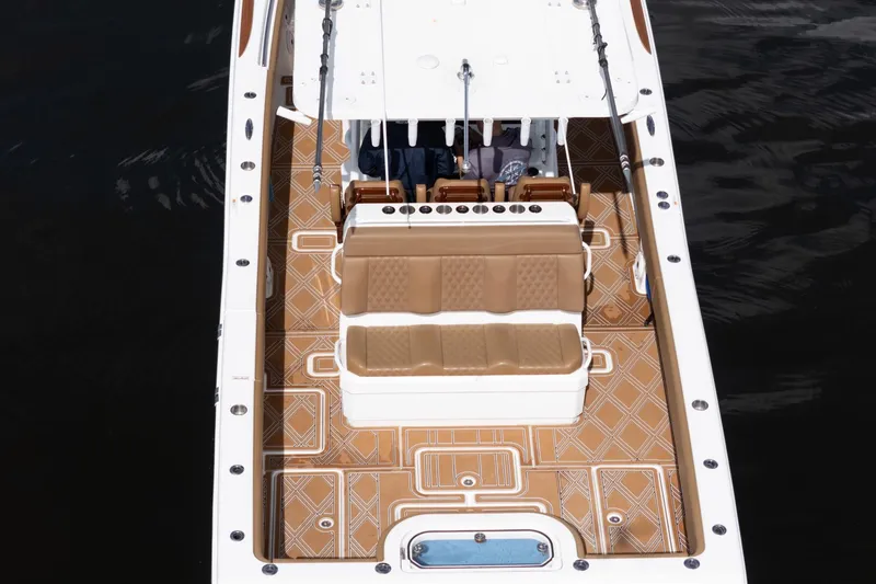 Slide: The Image of 2022 Invincible 39 Open Fisherman boat with tan seating and deck, viewed from above. - 48