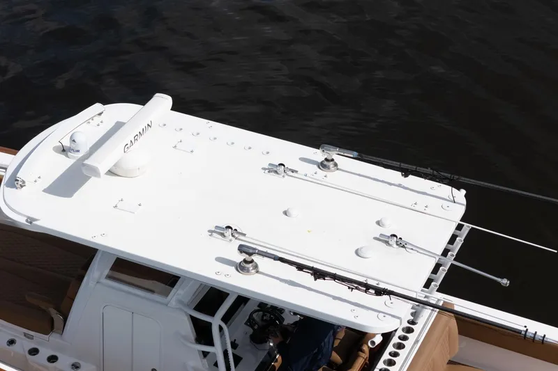Slide: The Image of Overhead view of 2022 Invincible 39 Open Fisherman boat with Garmin equipment. - 51