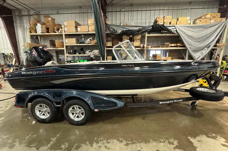 The Image of 2023 Ranger 1850MS boat on trailer in a storage facility. - 0
