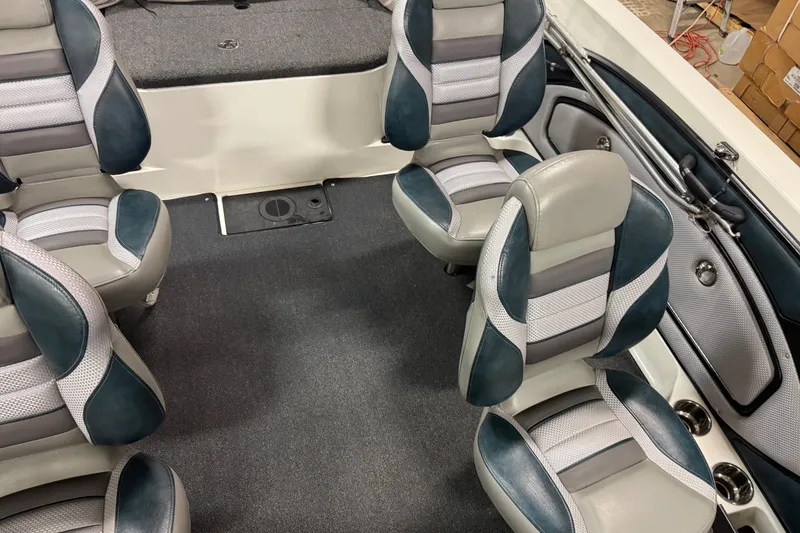 Slide: The Image of 2023 Ranger 1850MS boat interior with stylish seating and modern design. - 12