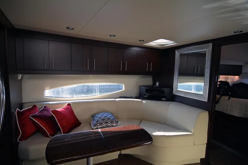 Slide: The Image of Luxurious interior of 2018 Regal 46 Sport Coupe yacht with elegant seating and decor. - 14