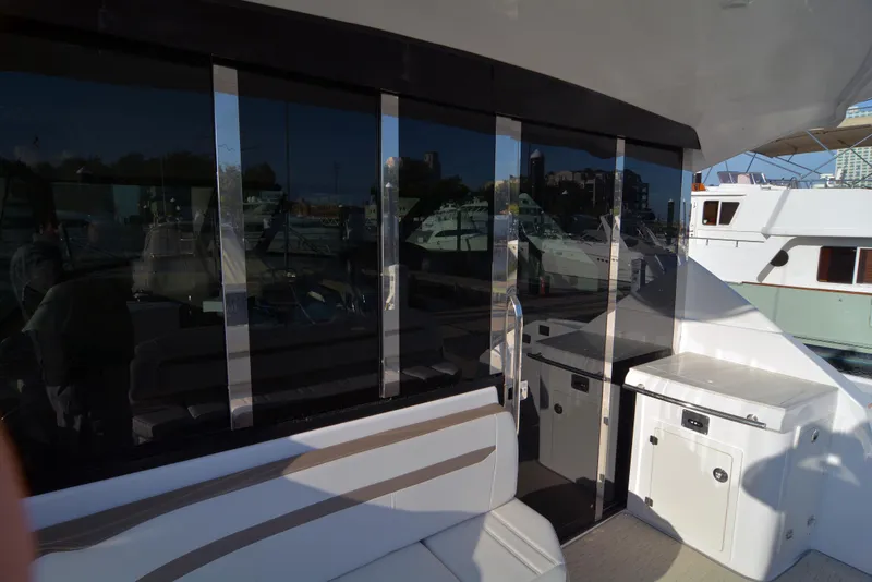 Slide: The Image of 2018 Regal 46 Sport Coupe yacht with sleek exterior and modern design. - 8