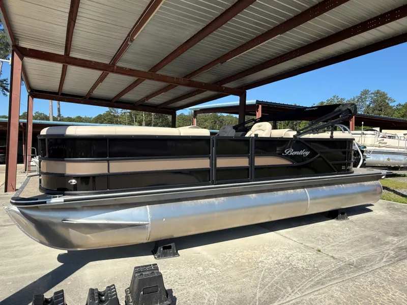 The Image of 2026 Bentley Pontoons Legacy Quad 223 on trailer, side view. - 0