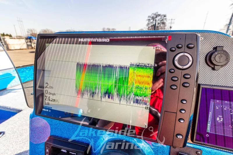Slide: The Image of Sonar display on 2024 Recon 985 SC boat, showing depth and temperature readings. - 23