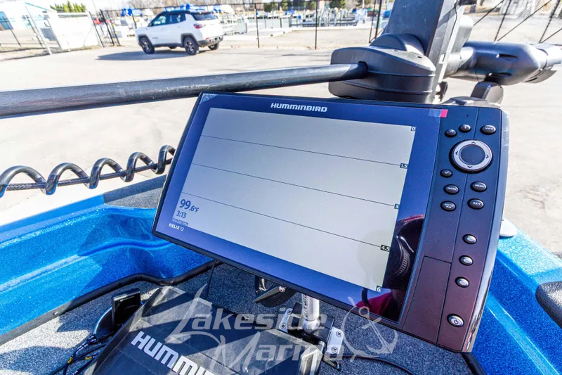 Slide: The Image of ```json { "alt_text": "2024 Recon 985 SC boat with Humminbird fish finder display." } ``` - 33