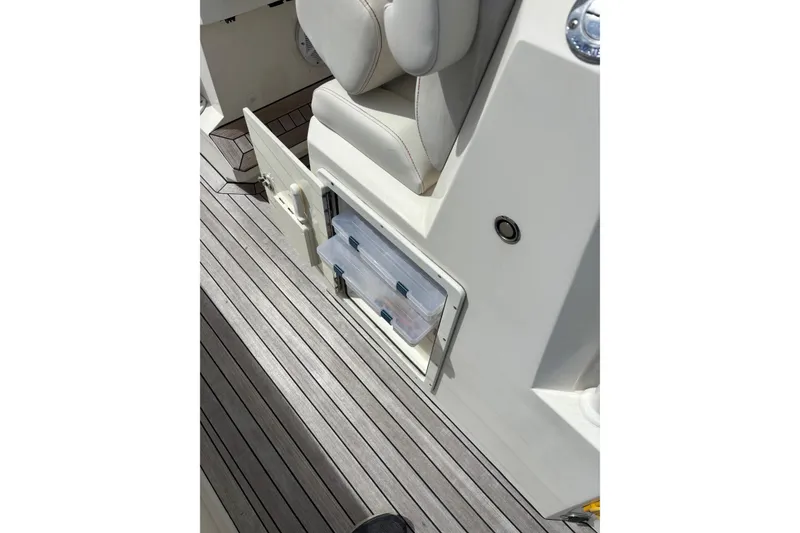 Slide: The Image of Boat interior with storage compartment and cushioned seat, Ocean 1 R model, 2018. - 17