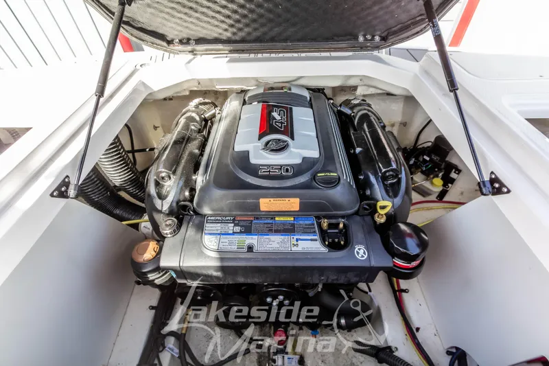 Slide: The Image of 2023 Chaparral 21 Surf boat engine compartment with Mercury 4.5L 250 HP engine. - 20