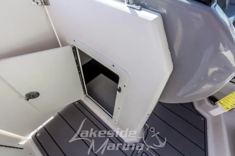 Slide: The Image of 2023 Chaparral 21 Surf boat storage compartment at Lakeside Marina. - 31