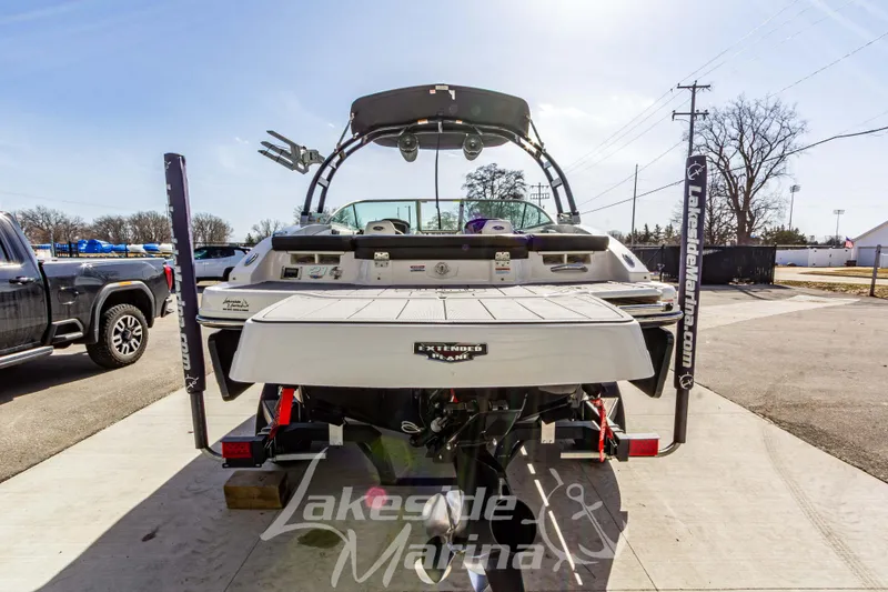Slide: The Image of 2023 Chaparral 21 Surf boat rear view at Lakeside Marina. - 5