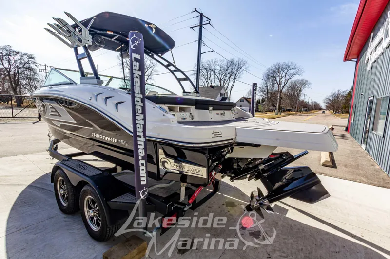 Slide: The Image of 2023 Chaparral 21 Surf boat on trailer at Lakeside Marina, rear view. - 6
