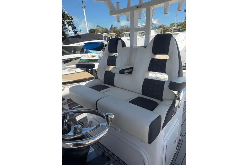 Slide: The Image of 2024 Tidewater 3100 Carolina Bay boat seating with modern design and comfortable upholstery. - 17