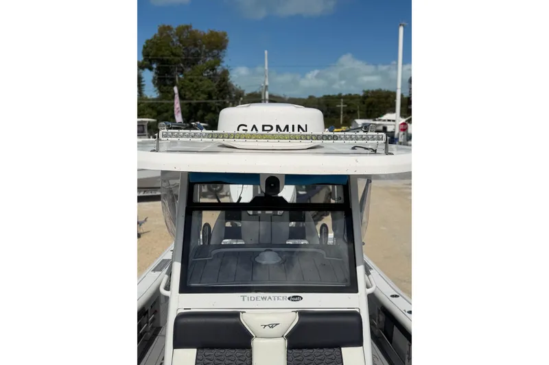 Slide: The Image of 2024 Tidewater 3100 Carolina Bay boat with Garmin equipment, front view. - 26