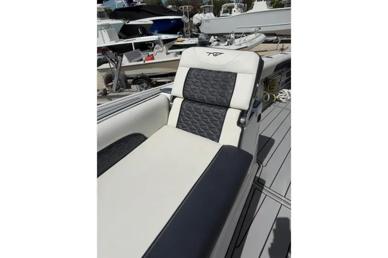 Slide: The Image of 2024 Tidewater 3100 Carolina Bay boat seat with quilted upholstery design. - 30