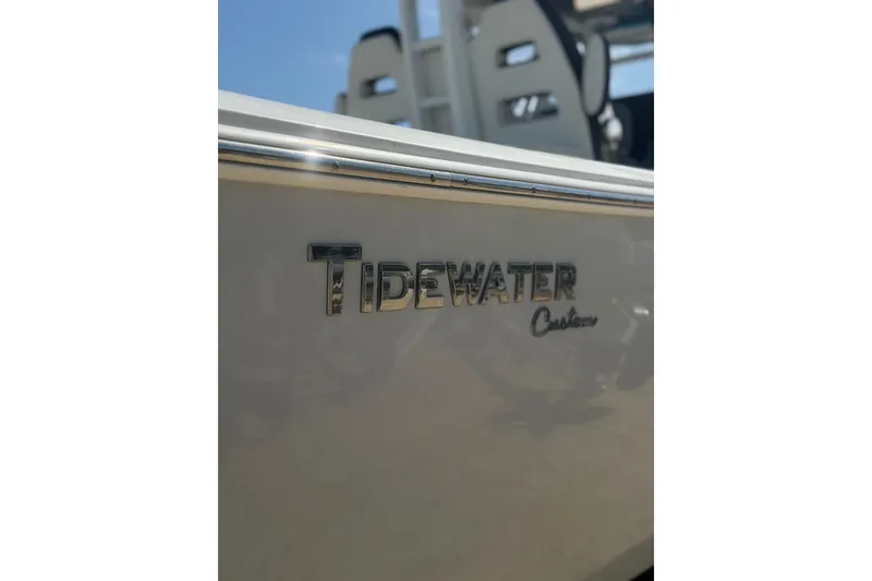 Slide: The Image of 2024 Tidewater 3100 Carolina Bay boat with custom logo detail. - 34