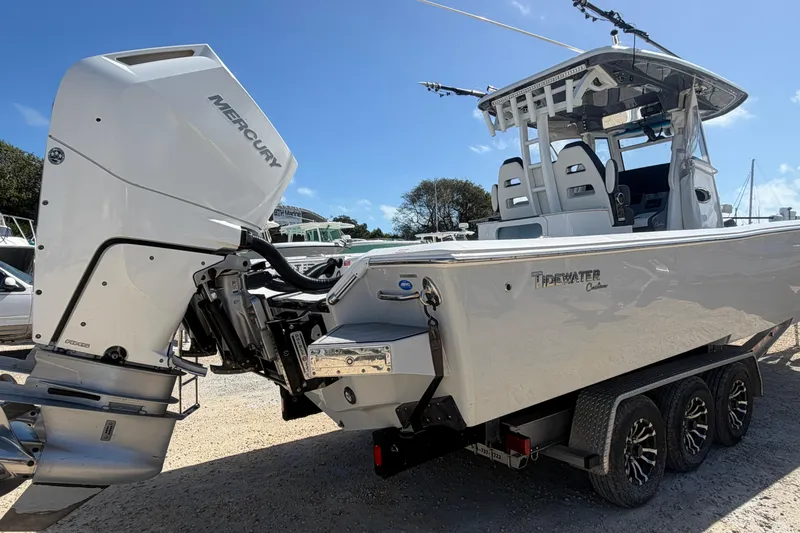 Slide: The Image of 2024 Tidewater 3100 Carolina Bay boat with Mercury engine on trailer. - 36