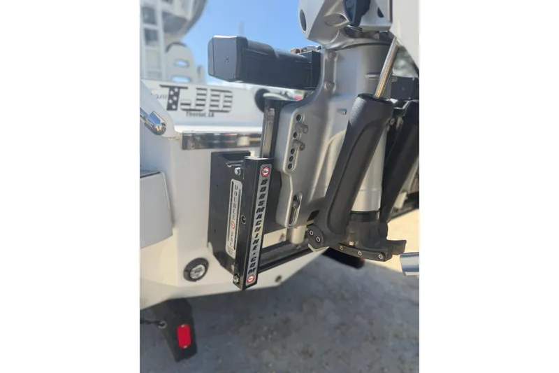 Slide: The Image of 2024 Tidewater 3100 Carolina Bay boat engine mount detail in sunlight. - 6