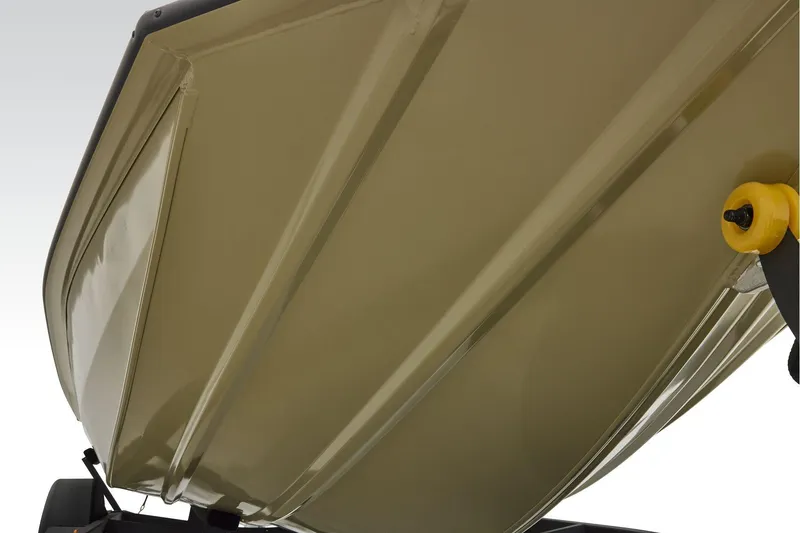 Slide: The Image of Manufacturer Provided Image: 2026 Tracker Pro Team 195 boat hull with yellow roller on trailer. - 24