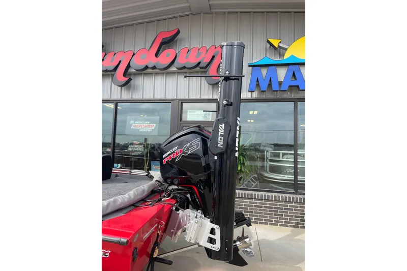 Slide: The Image of 2026 Tracker Pro Team 195 boat with Mercury Pro XS engine at marina. - 3