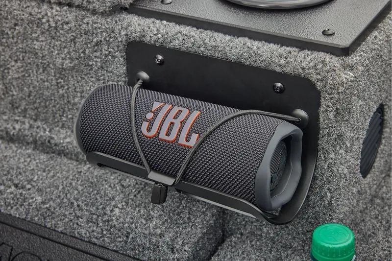 Slide: The Image of Manufacturer Provided Image: JBL speaker mounted on 2026 Tracker Pro Team 195 boat with textured surface. - 42