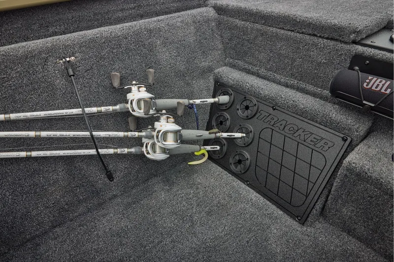 Slide: The Image of Manufacturer Provided Image: 2026 Tracker Pro Team 195 boat interior with fishing rods and JBL speaker. - 43
