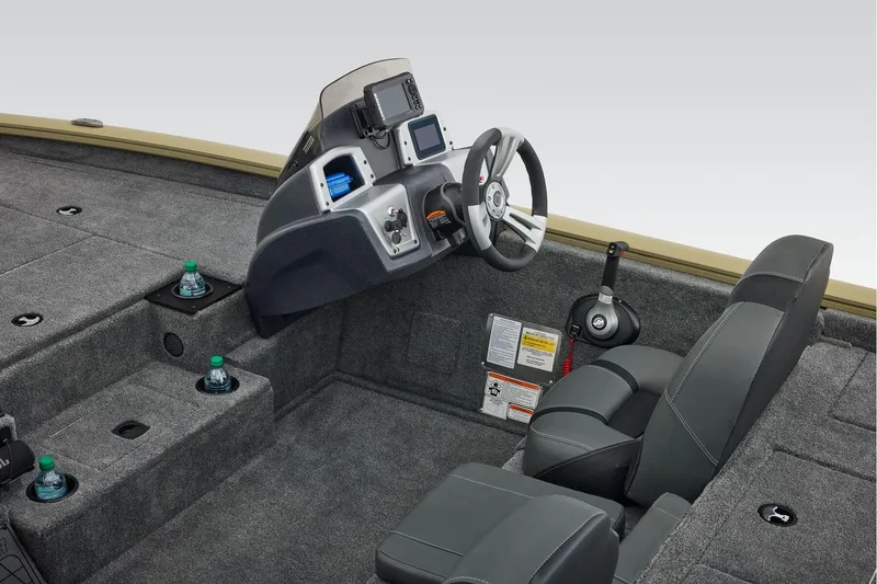 Slide: The Image of Manufacturer Provided Image: 2026 Tracker Pro Team 195 boat interior with steering console and seating. - 45